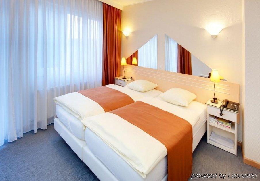 City Hotel Luxemburg Szoba fotó