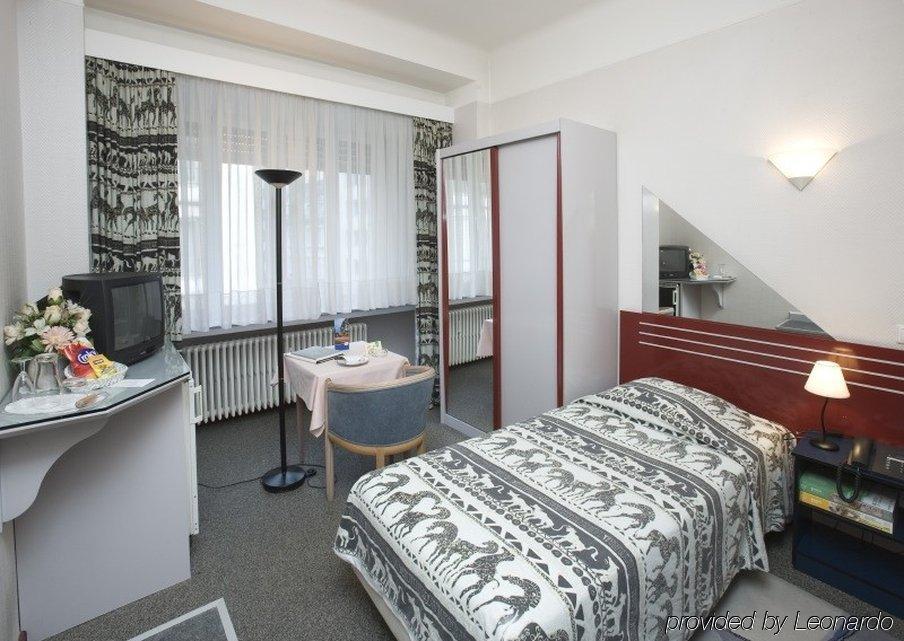 City Hotel Luxemburg Szoba fotó